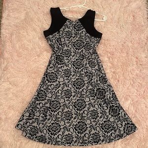 Party in the back! Adorable black dress for any formal event